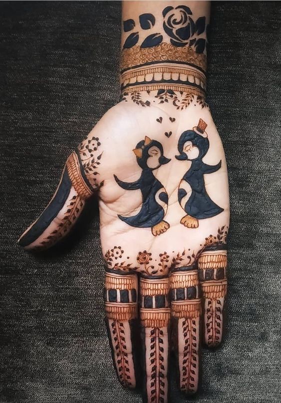 Top 80+ Simple Mehndi Designs for Kids, Babies, & Toddlers (2026) 50 Lovable Penguin mehndi Designs for kids
