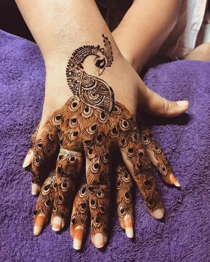 Majestic Peacock Feather Finger Mehndi Design