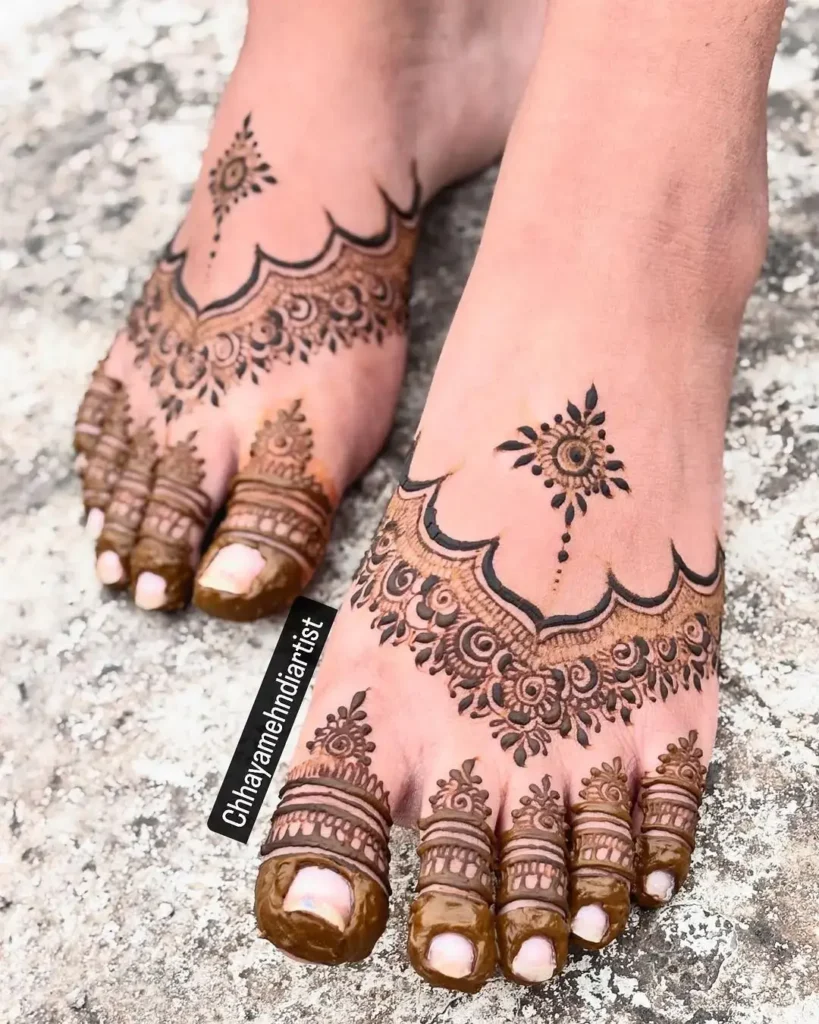 60+ Modern Mehndi Designs for Karwa Chauth (2026) 29 Delicate Vine and Leaf Foot Mehndi Design Trend