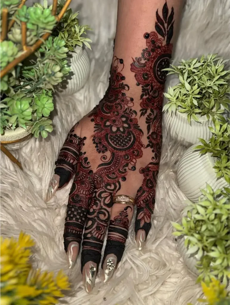 60+ Stylish Back Hand Mehndi Designs You Must Try in 2026! 7 arabic with droplets back hand mehndi designs