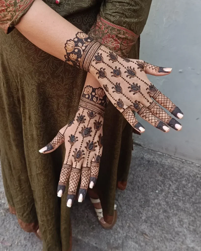 bridal heavy back hand lotus flower mehndi designs