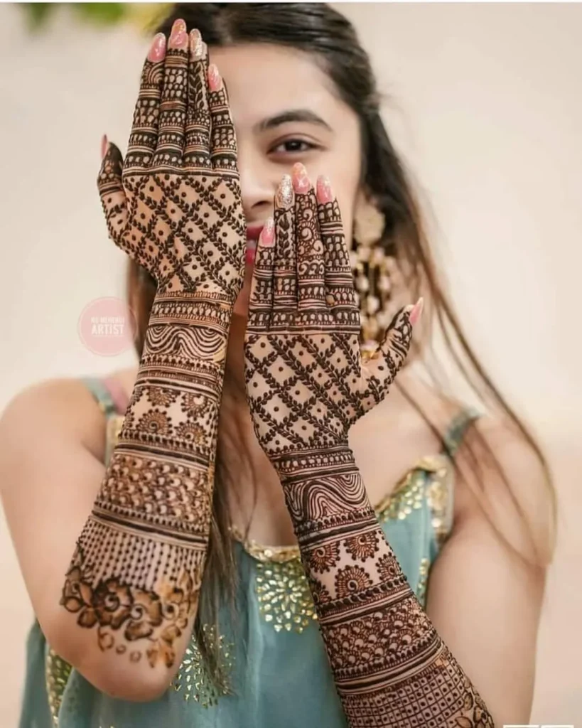 60+ Stylish Back Hand Mehndi Designs You Must Try in 2026! 29 columned back hand mehndi designs