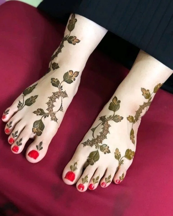 40+ Foot and Leg Mehndi Designs: Easy, Simple & Bridal Look for 2026 17 curved vine with leaves leg mehndi design