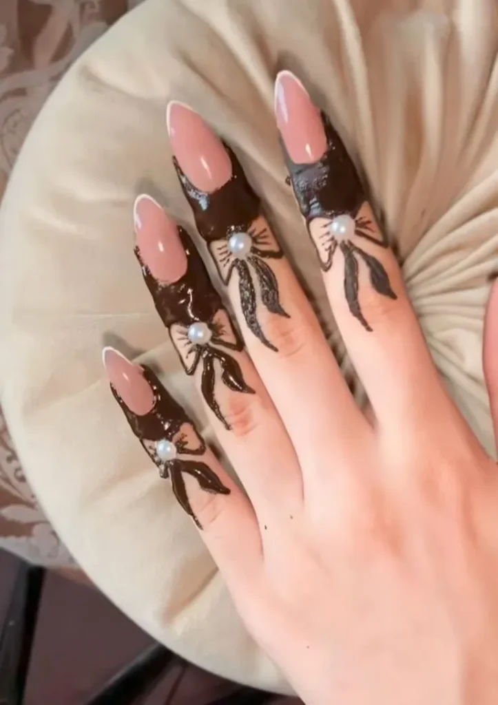 finger rings with bow accents arabic mehndi designs