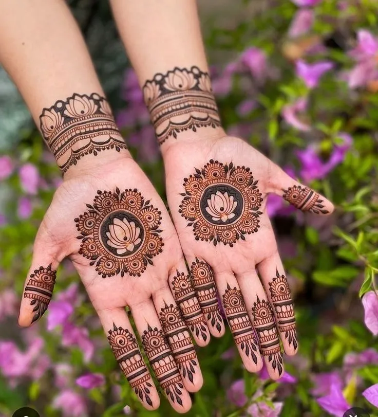 front hand lotus flower mehndi design with paisley borders