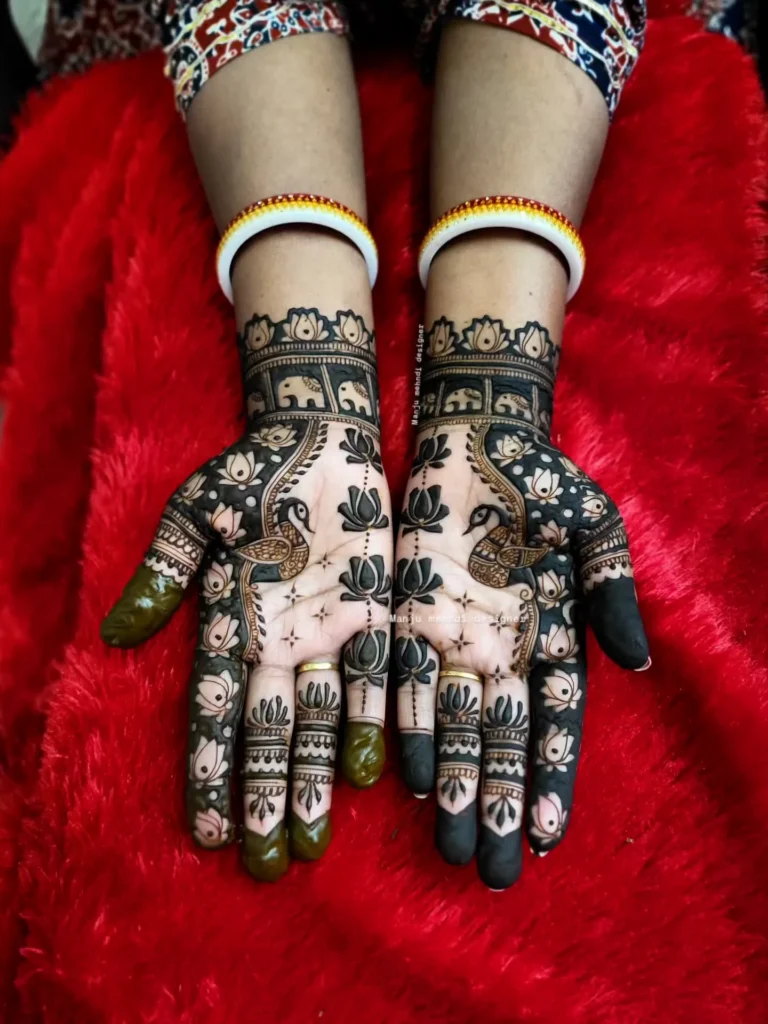 front hand lotus flower mehndi design with peacock motif