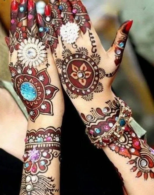 60+ Stylish Back Hand Mehndi Designs You Must Try in 2026! 54 glitter fusion back hand mehndi designs