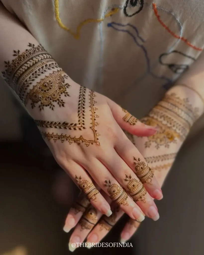 60+ Stylish Back Hand Mehndi Designs You Must Try in 2026! 51 half back hand mehndi designs