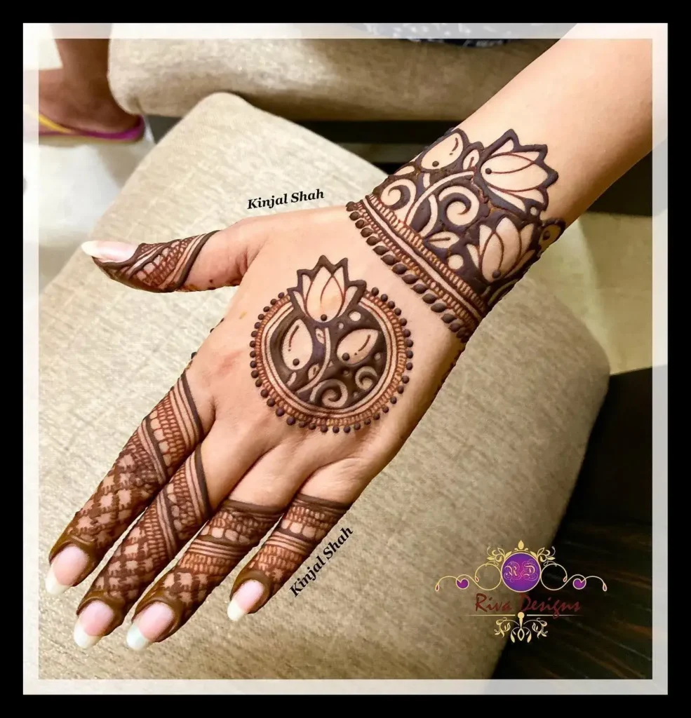 negative-space back hand lotus flower mehndi designs