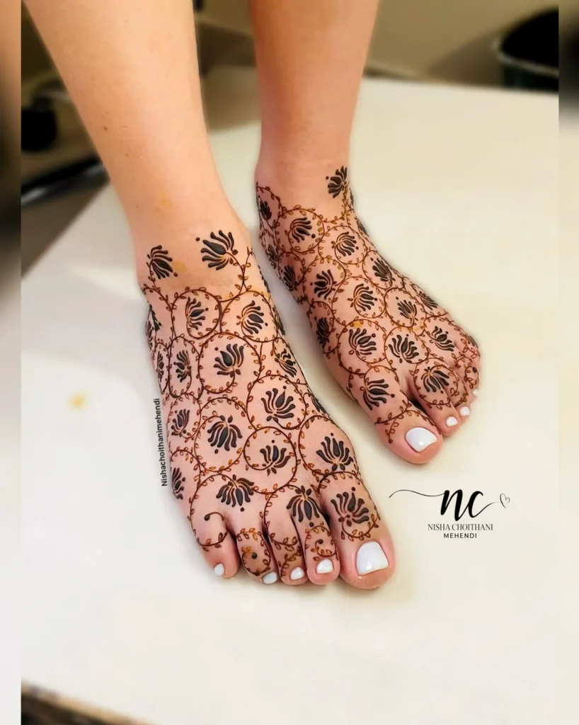 40+ Foot and Leg Mehndi Designs: Easy, Simple & Bridal Look for 2026 38 scattered small blooms mehndi design for feet