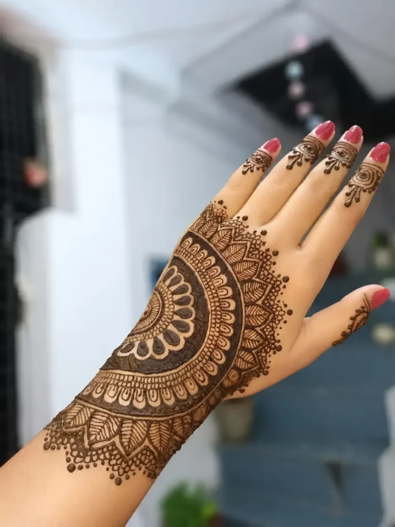 60+ Stylish Back Hand Mehndi Designs You Must Try in 2026! 24 semi-mandala back hand mehndi designs