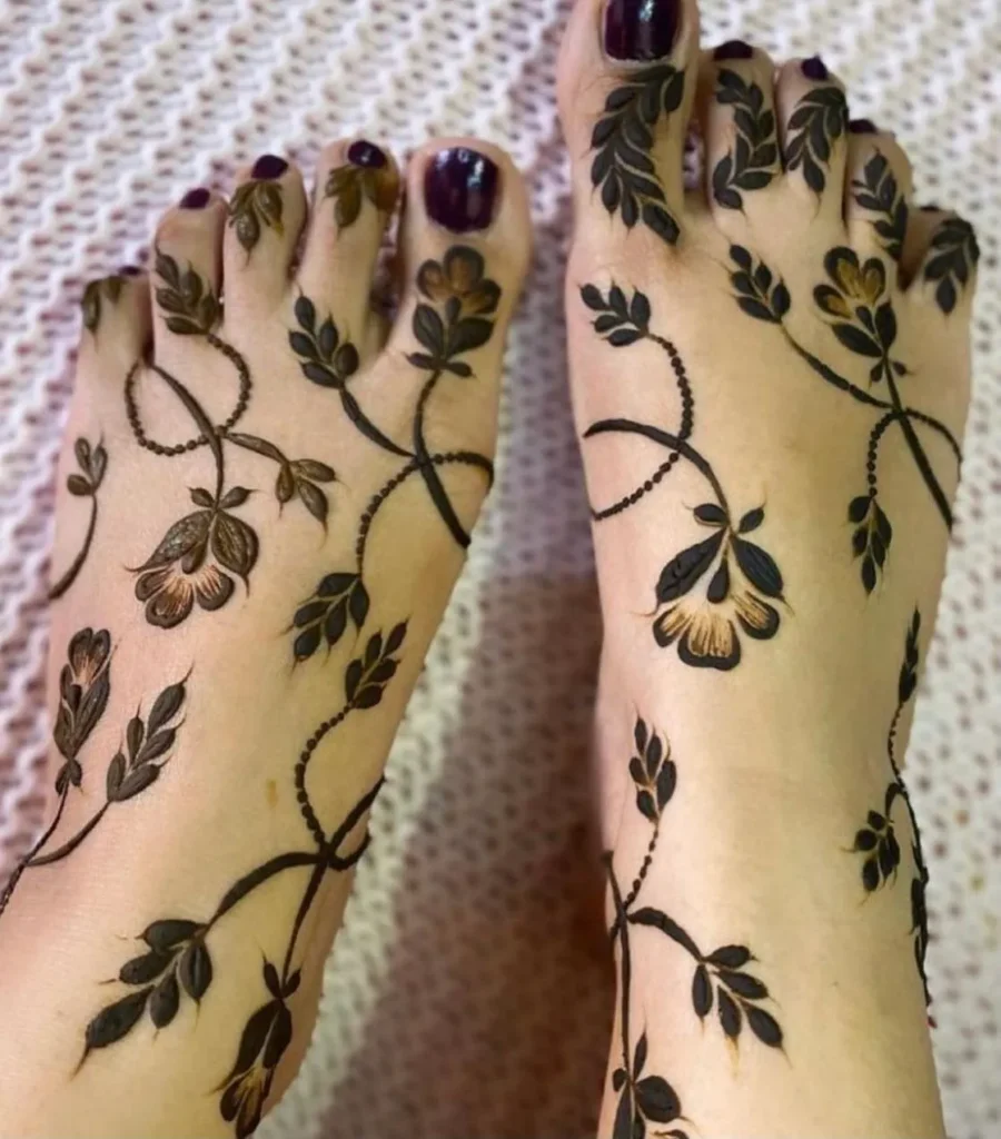 40+ Foot and Leg Mehndi Designs: Easy, Simple & Bridal Look for 2026 39 symmetrical floral bunches mehndi design for feet