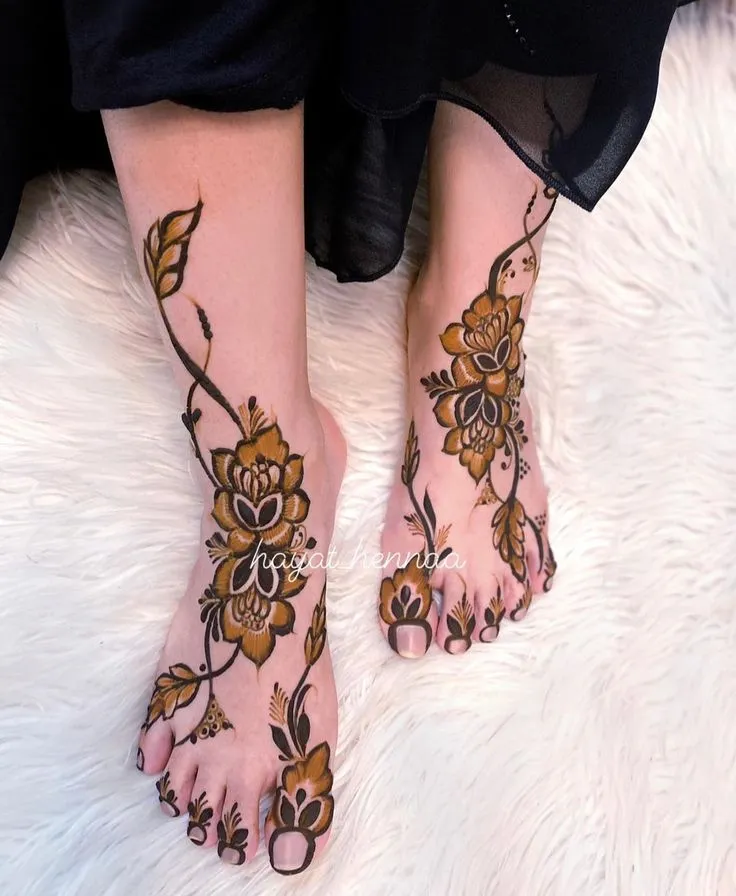 40+ Foot and Leg Mehndi Designs: Easy, Simple & Bridal Look for 2026 15 three-flower cluster leg mehndi design