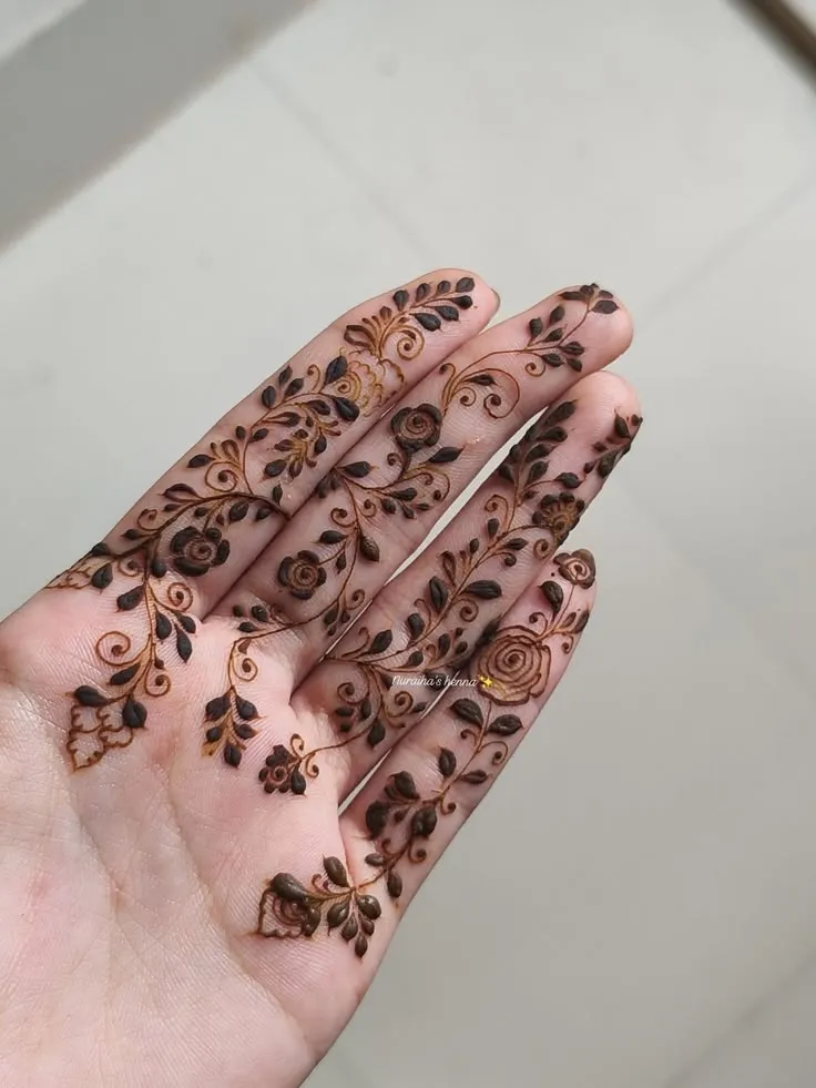 Finger Mehndi Design: 40+ Ideas for When the Event Is Tomorrow 8 tiny flower with a short vine finger mehndi designs