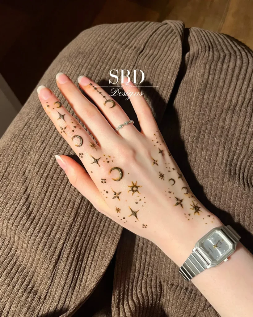 60+ Stylish Back Hand Mehndi Designs You Must Try in 2026! 48 zodiac and symbol back hand mehndi designs